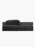 Fringed designer sofa by Ann Demeulemeester, Luxury deep-seated black and white sofa, 
Contemporary fringed statement furniture