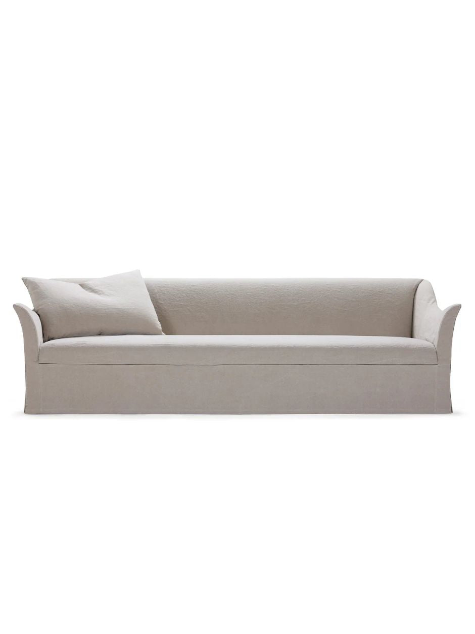 Minimalist Brigitte sofa by Blasco, Spain, in light neutral textile with soft cushions and tailored skirt