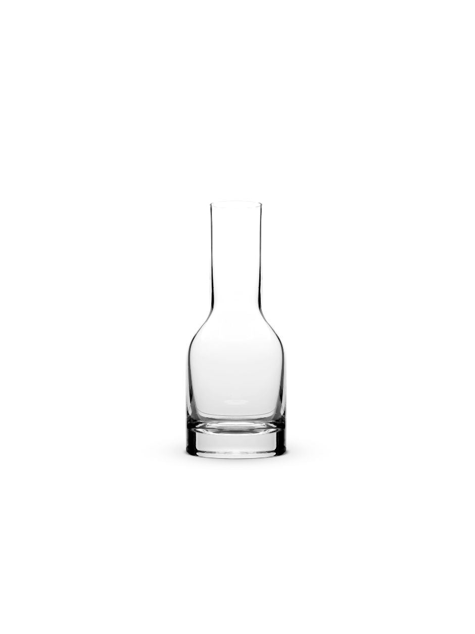 John Pawson Bohemian crystal carafe on white background  
Mouth-blown crystal carafe by John Pawson, 75cl capacity  
Minimalist crystal carafe for water or wine  
Elegant designer carafe made from Bohemian crystal  
Close-up of handcrafted John Pawson crystal carafe  
Contemporary glass carafe with clean, modern lines  
Crystal carafe paired with matching John Pawson glasses  
Sculptural 75cl carafe in fine Bohemian crystal  
Luxury table carafe in minimalist architectural style  
High-end designer crystal 