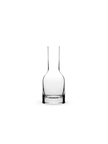 John Pawson Bohemian crystal carafe on white background  
Mouth-blown crystal carafe by John Pawson, 75cl capacity  
Minimalist crystal carafe for water or wine  
Elegant designer carafe made from Bohemian crystal  
Close-up of handcrafted John Pawson crystal carafe  
Contemporary glass carafe with clean, modern lines  
Crystal carafe paired with matching John Pawson glasses  
Sculptural 75cl carafe in fine Bohemian crystal  
Luxury table carafe in minimalist architectural style  
High-end designer crystal 