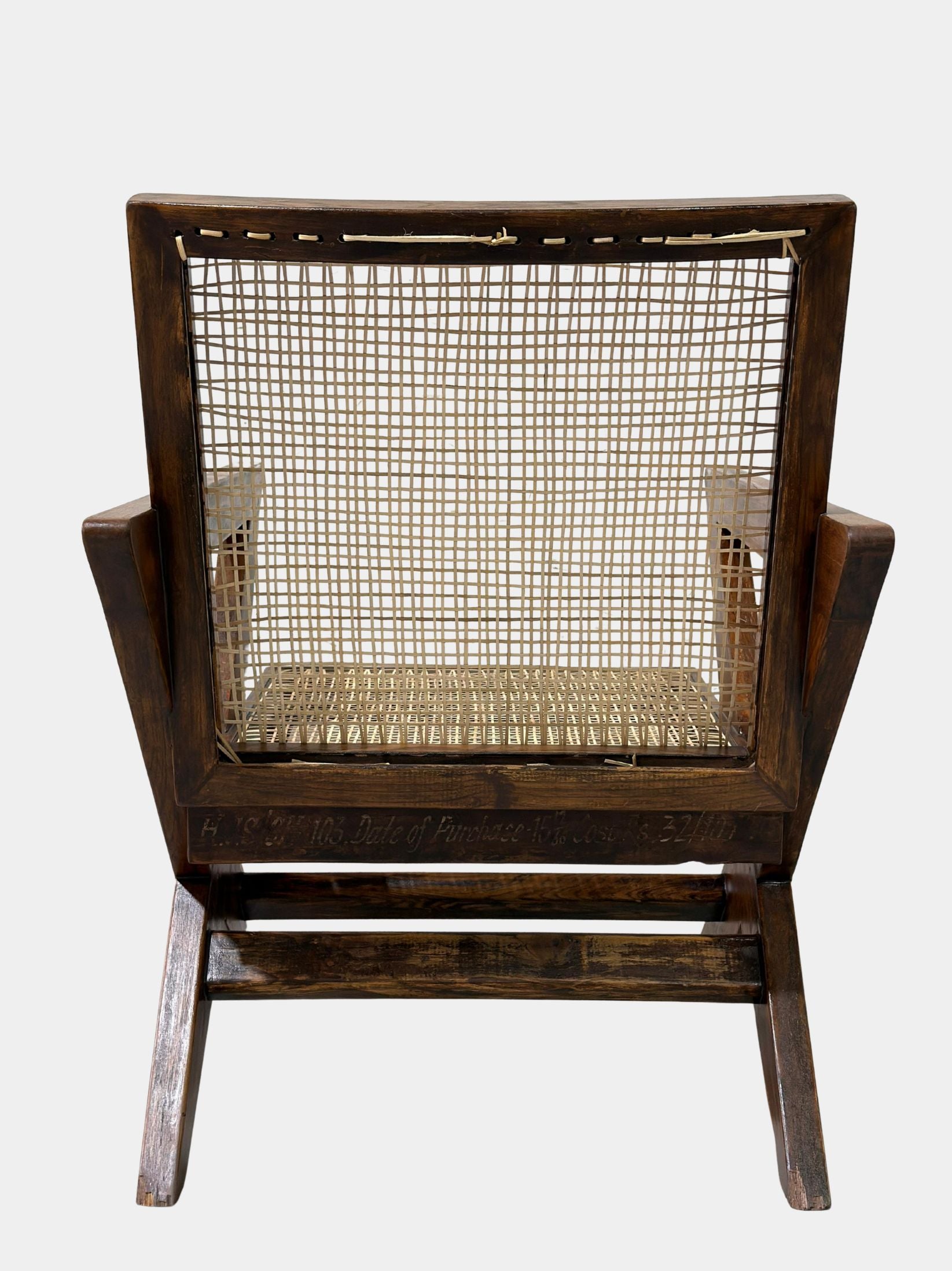 Back angle of Pierre Jeanneret X-leg lounge chair, handwoven cane backrest and teak frame, original H.C.S. markings