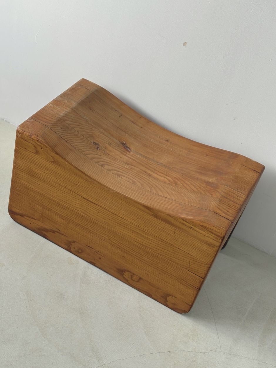 Top view of handmade wooden stool showing natural ash wood grain