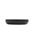 Elegant black ceramic and oak containers for bathroom or kitchen storage, designed by Vincent Van Duysen.
