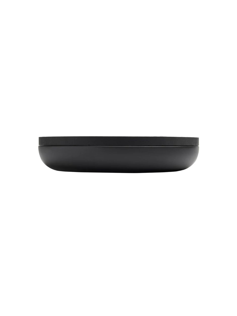Elegant black ceramic and oak containers for bathroom or kitchen storage, designed by Vincent Van Duysen.