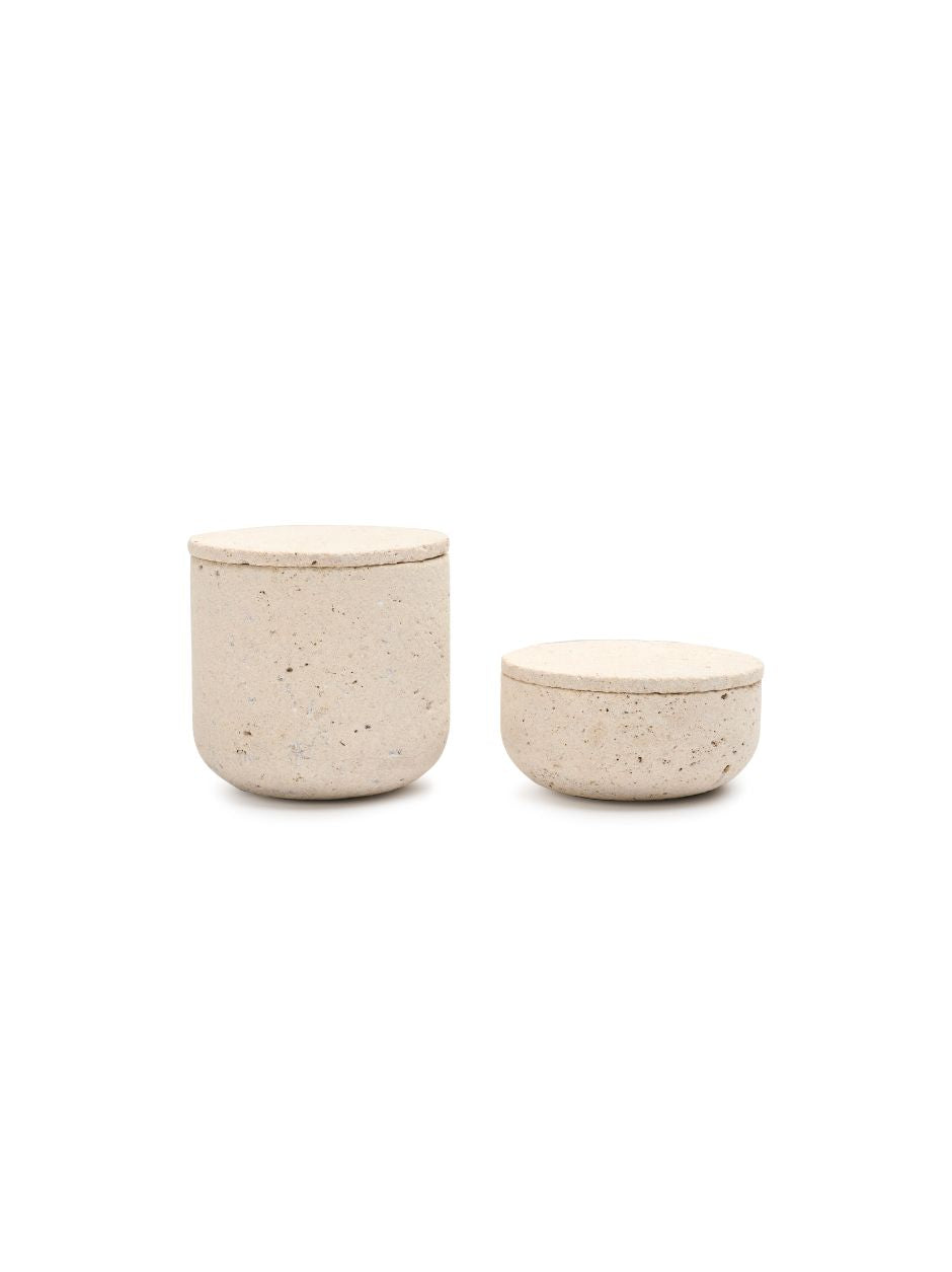 Set of two beige limestone storage pots with lids, designed by Vincent Van Duysen for the Bathroom Series