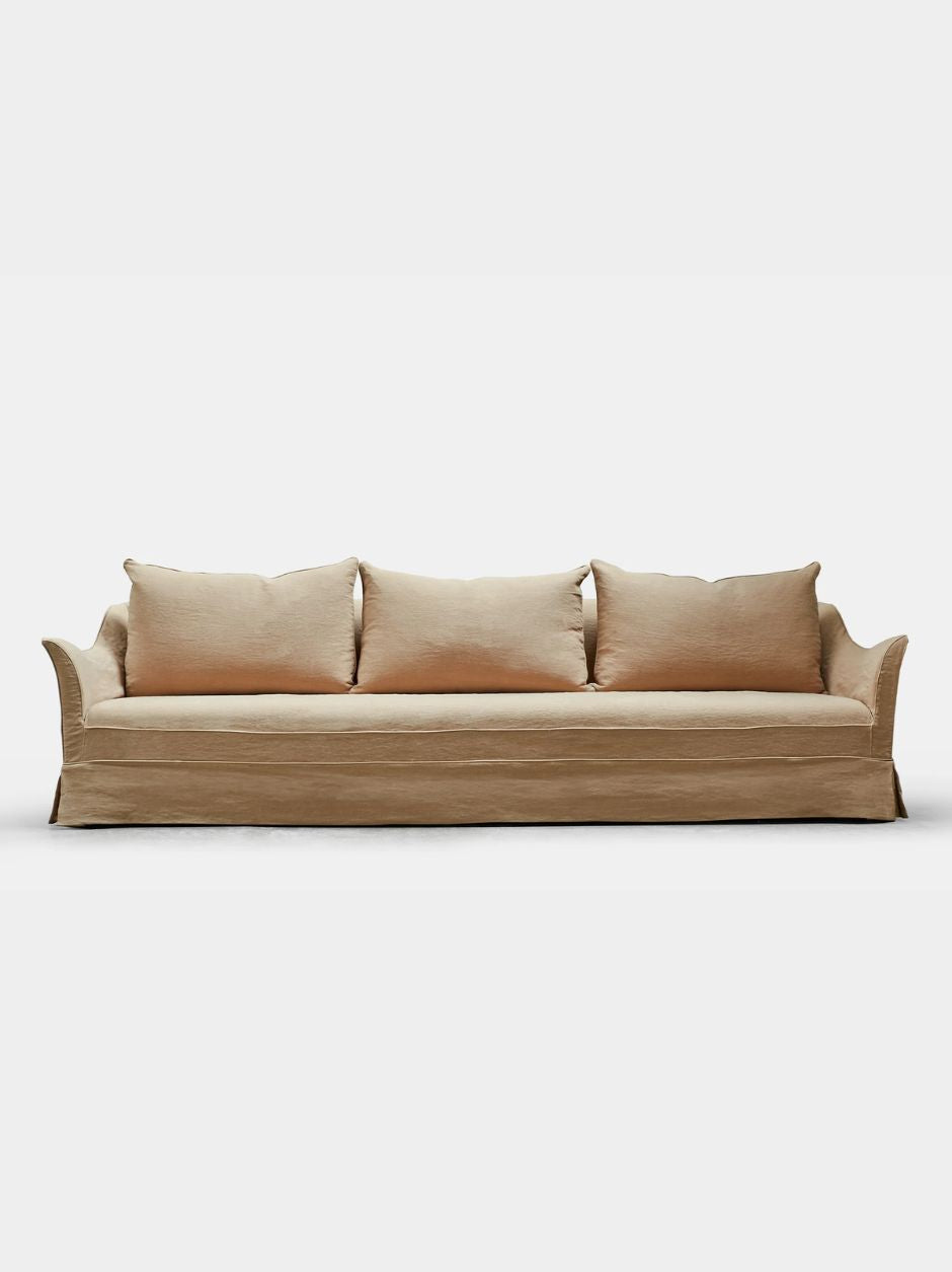 Minimalist Brigitte sofa by Blasco, Spain, in light neutral textile with soft cushions and tailored skirt