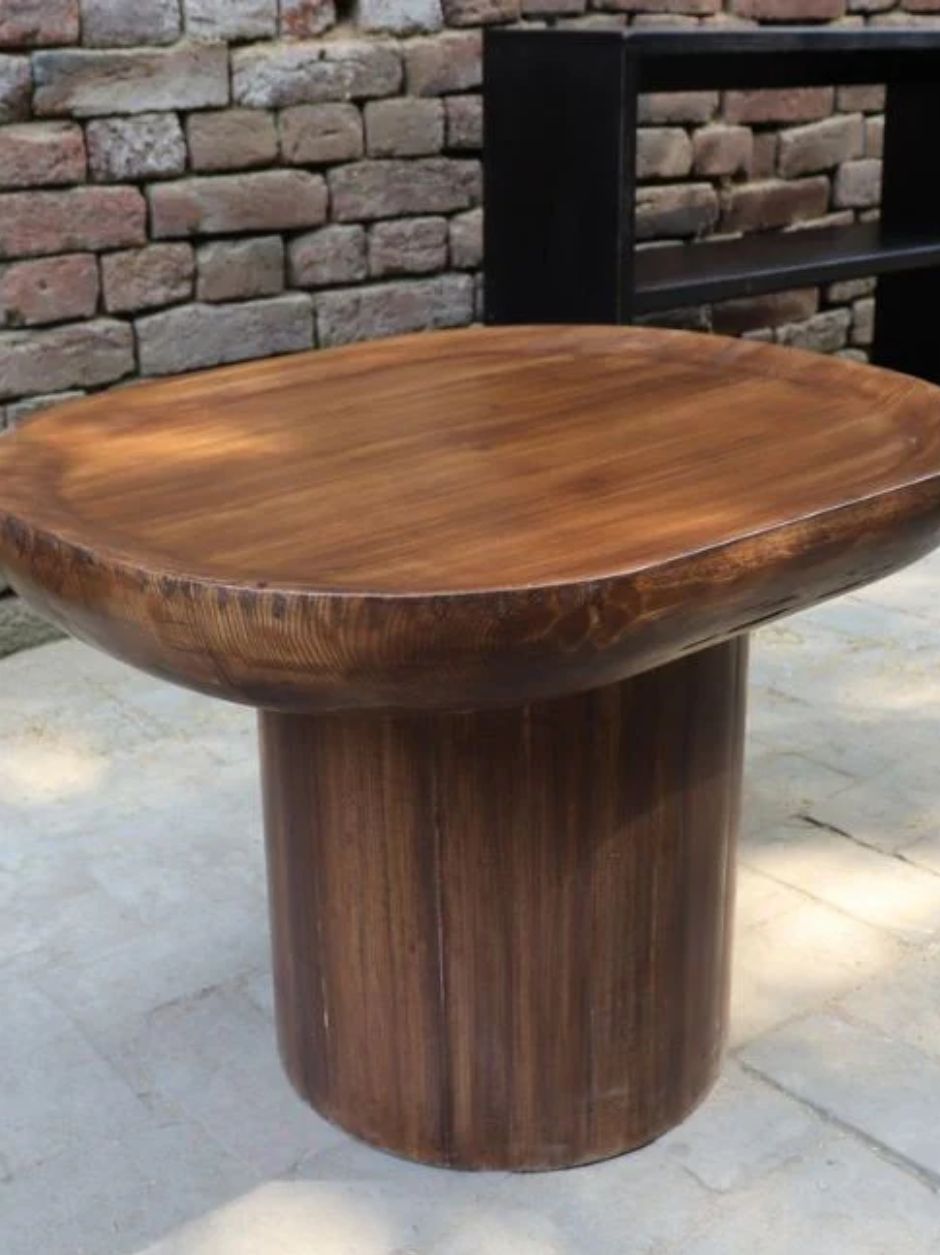 Uto round table inspired by Axel Einar Hjorth, featuring an oval-shaped bowl top with plateau rim and hand-sanded wooden planks.