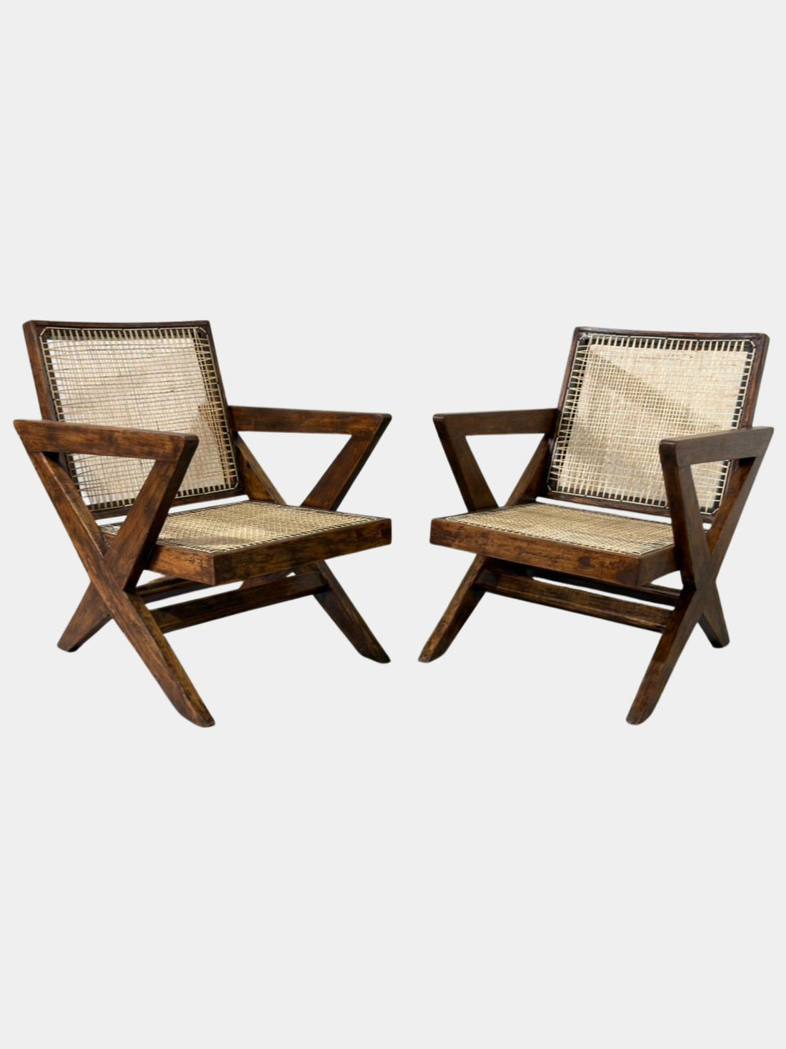 Front view of original Pierre Jeanneret X-leg lounge chairs, set of 2, teak and handwoven cane, Chandigarh High Court Secretariat provenance