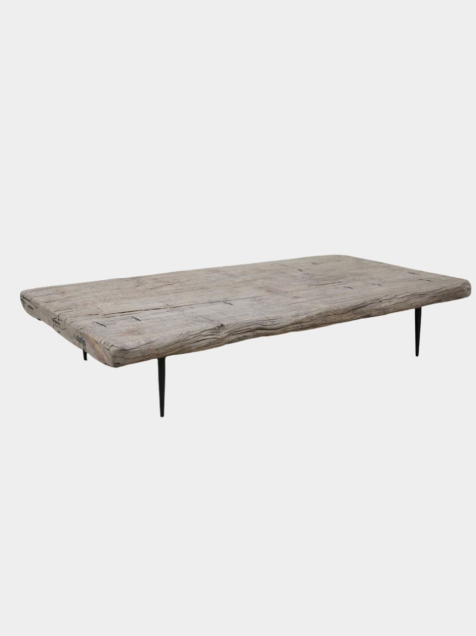 19th century Chinese poplar coffee table with thick solid wood top and minimalist metal legs, rustic antique design for modern interiors.