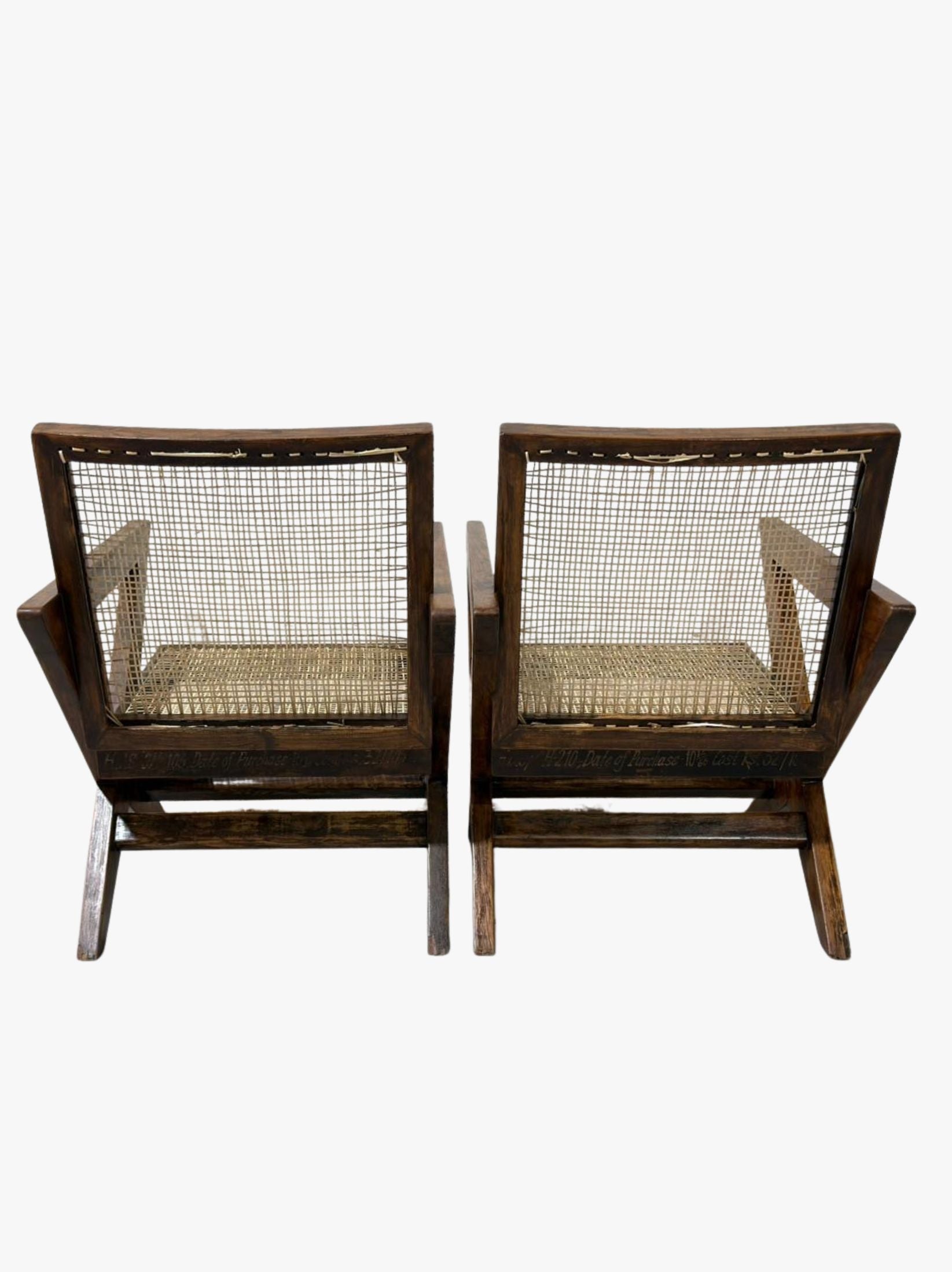 Rear view of Pierre Jeanneret X-leg lounge chair set, solid teak frame with handwoven cane, rare Chandigarh furniture
