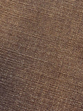 Vincent Van Duysen Rudolph one-seat outdoor lounge chair in beige oak and camel upholstery, showcasing minimalist mid-century modern design.